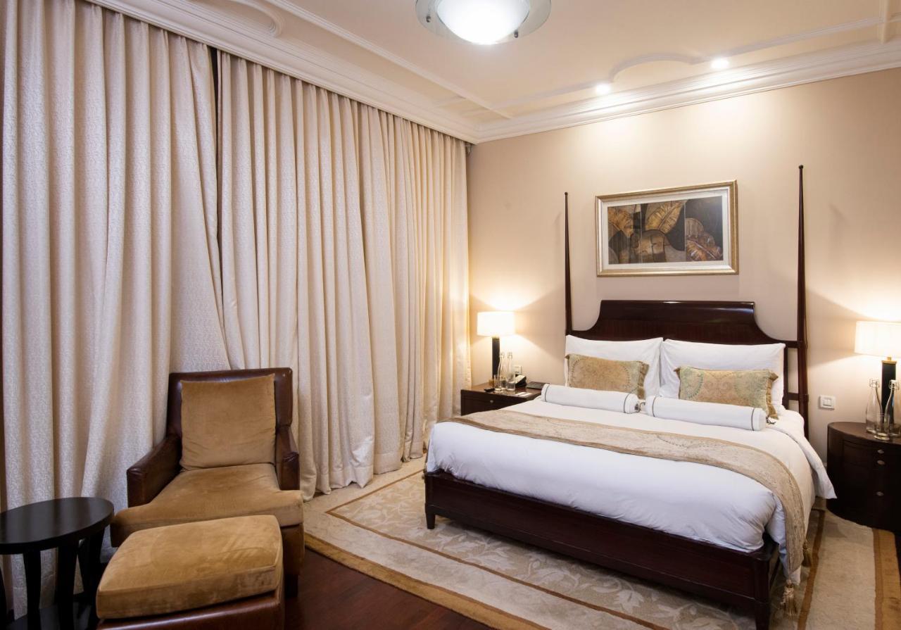 The Claridges New Delhi Ξενοδοχείο Εξωτερικό φωτογραφία A bedroom at the Taj Mahal Palace