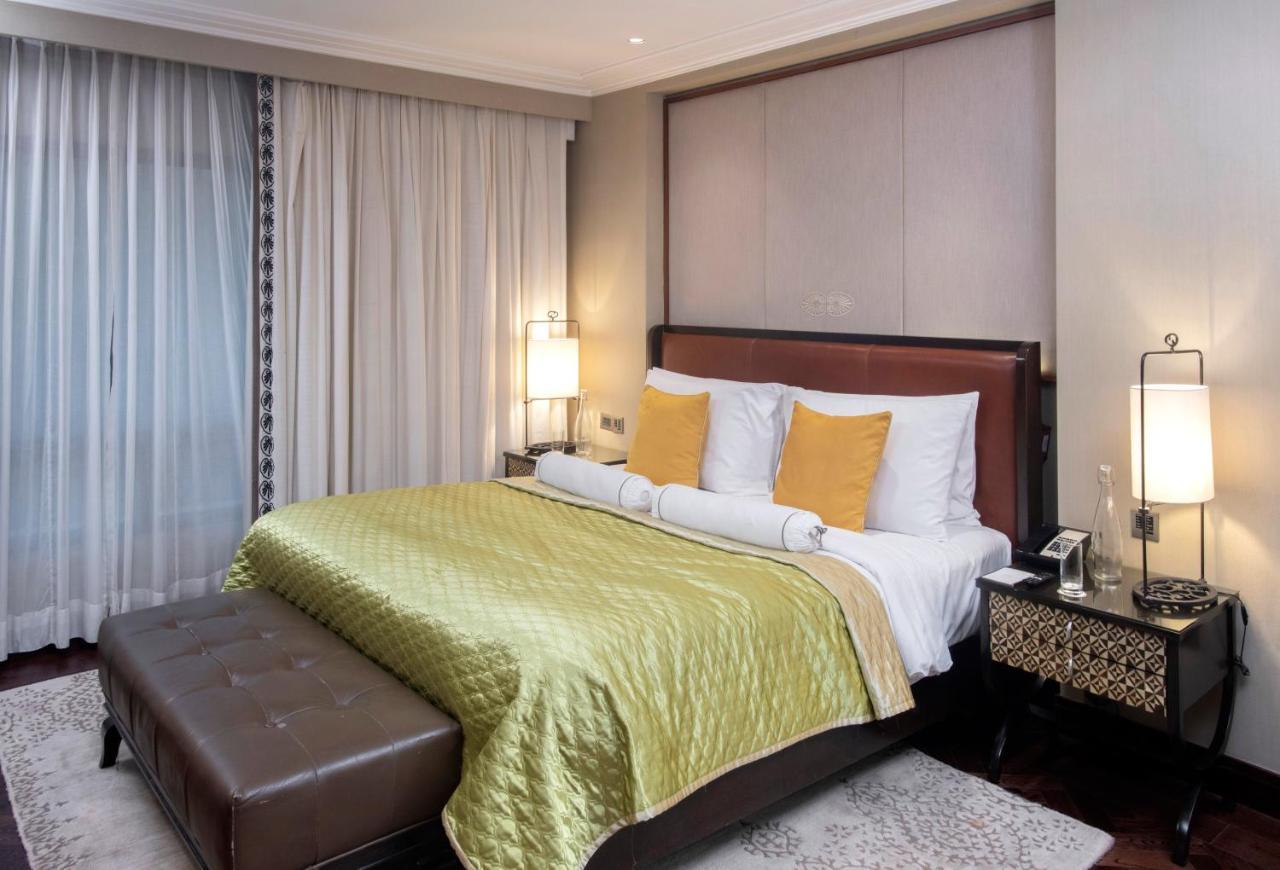 The Claridges New Delhi Ξενοδοχείο Εξωτερικό φωτογραφία A bedroom at the Taj Bengal